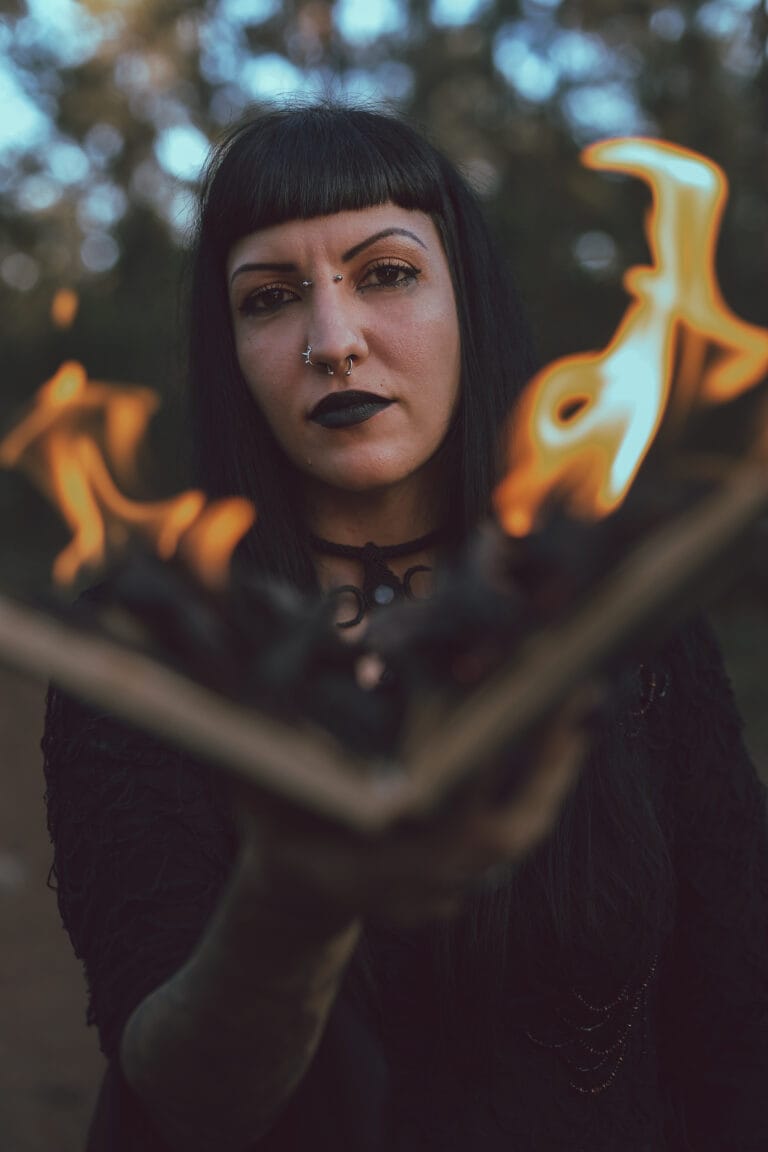 Creative Portraits made in Gold Coast of a woman burning a book