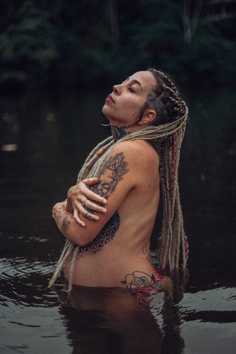 Creative Portraits made in Gold Coast of a pregnant woman in the water