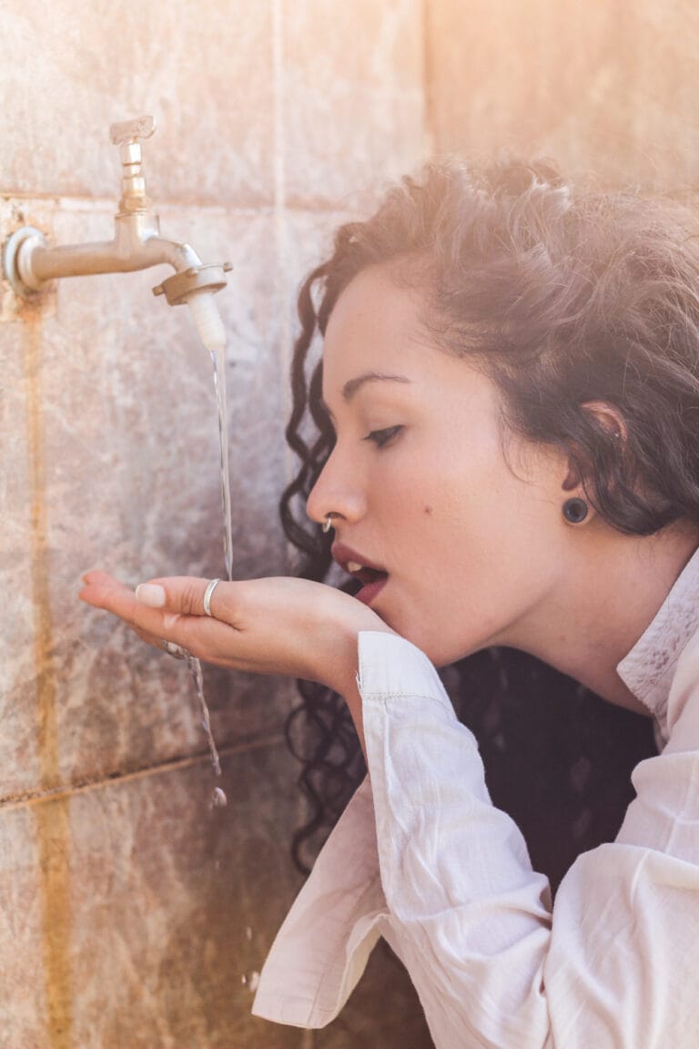 Creative Portraits made in Gold Coast of a woman drinking water