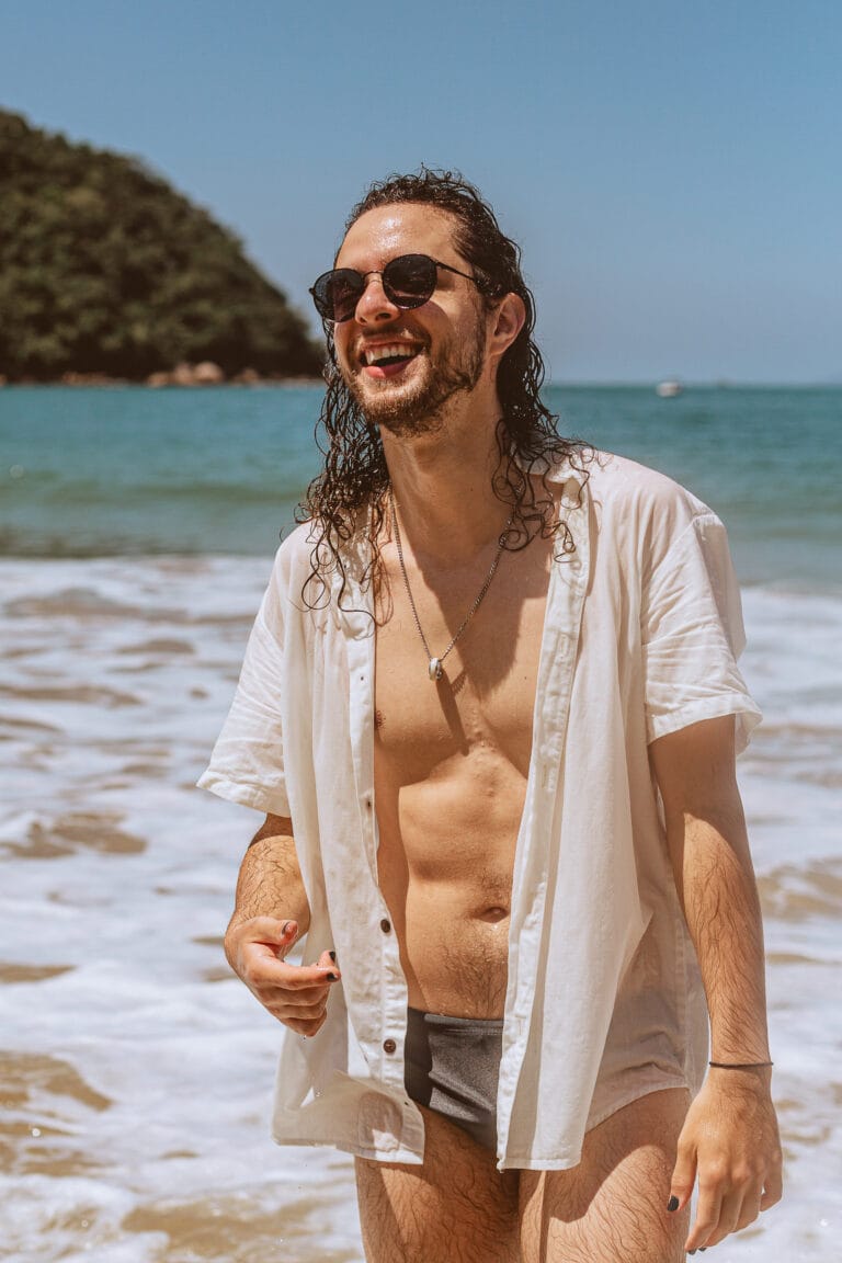 Creative Portraits made in Gold Coast of a man smiling at the beach