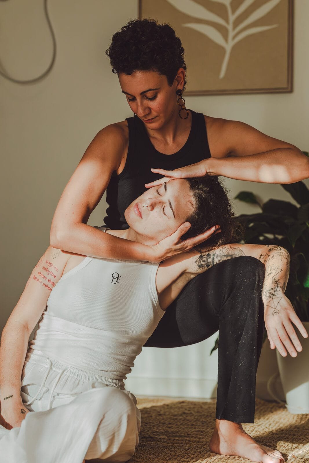 Marine giving a massage, her hands framing the movement