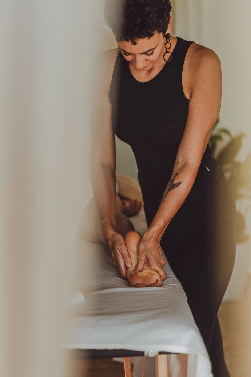 Marine applying firm pressure in a massage