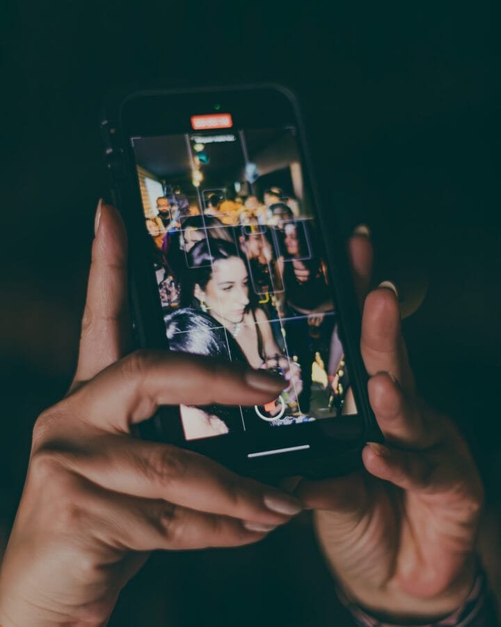 A phone capturing a moment at a party, event photo and video in Gold Coast