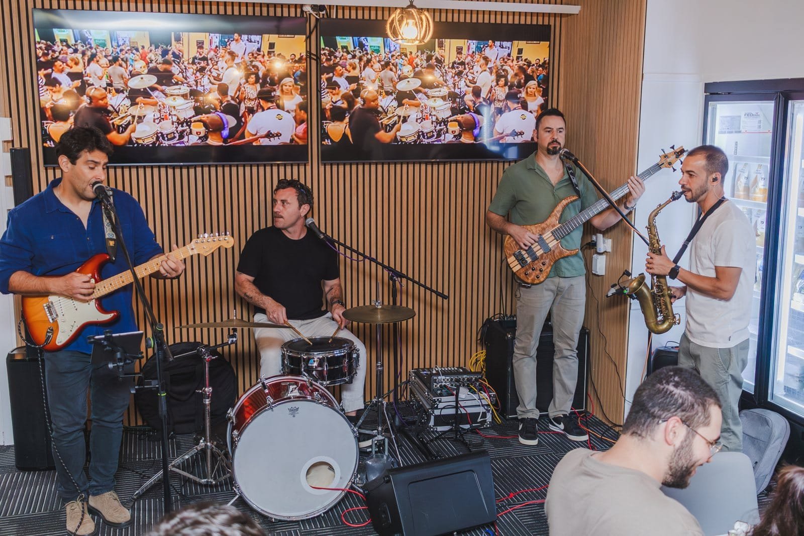 A live band playing at a venue opening, event photography Gold Coast