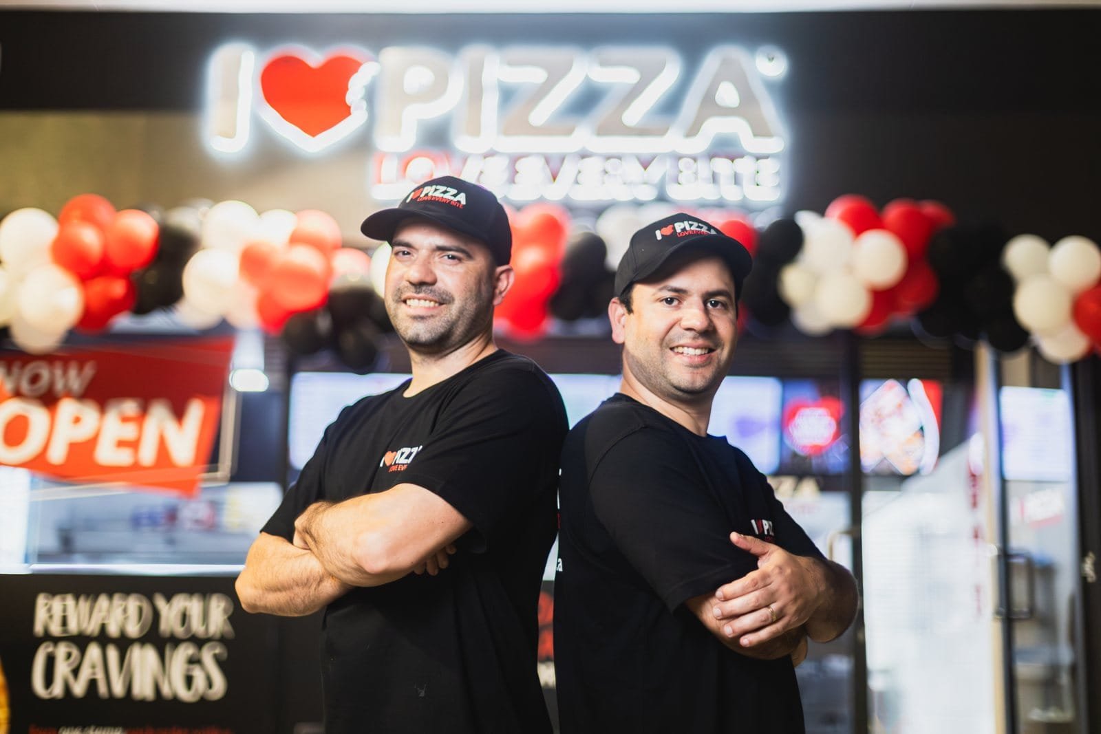Owners on the opening night of a pizzeria in Gold Coast