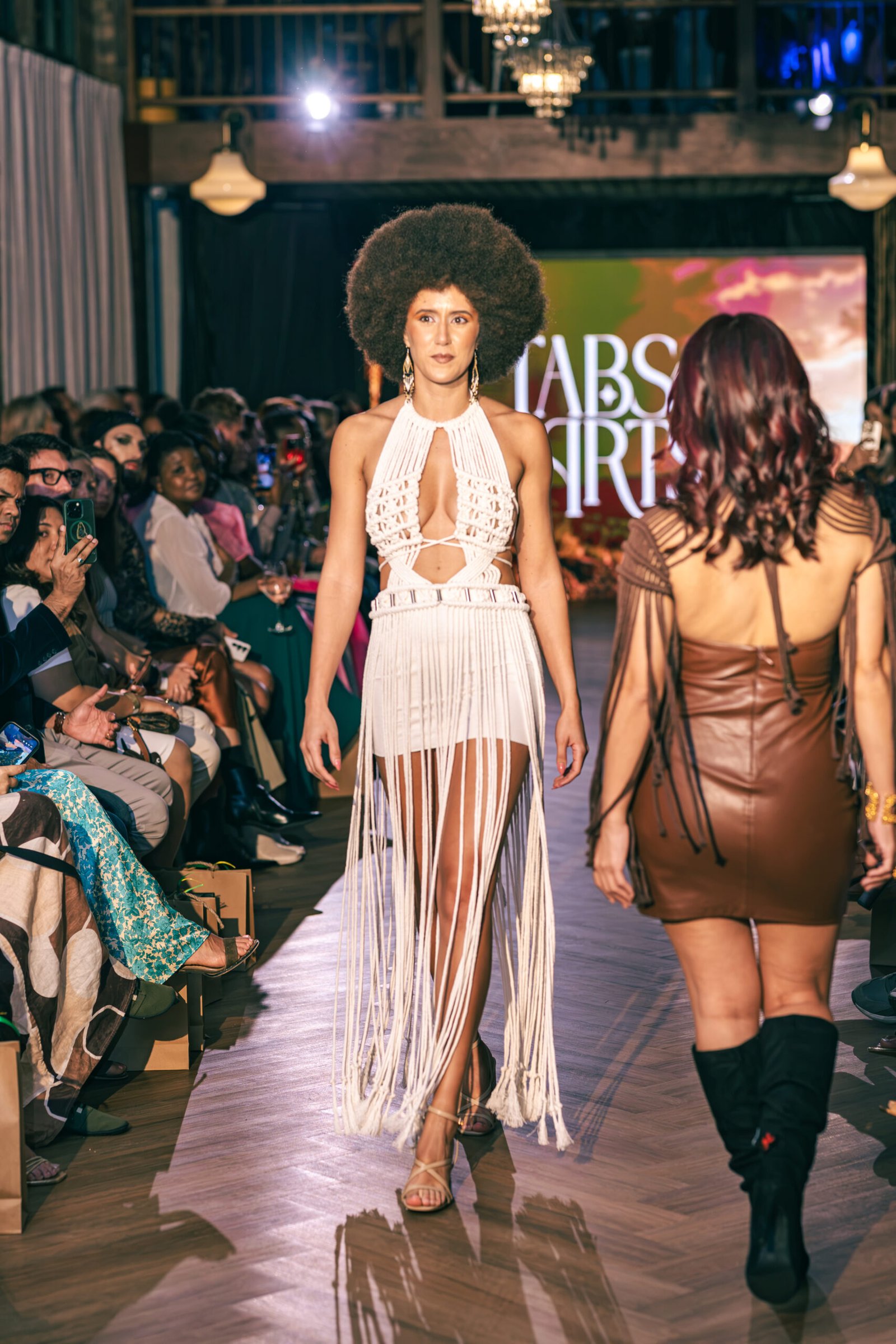 Model on the runway in a white fringe piece, Brazil Week Fashion Day