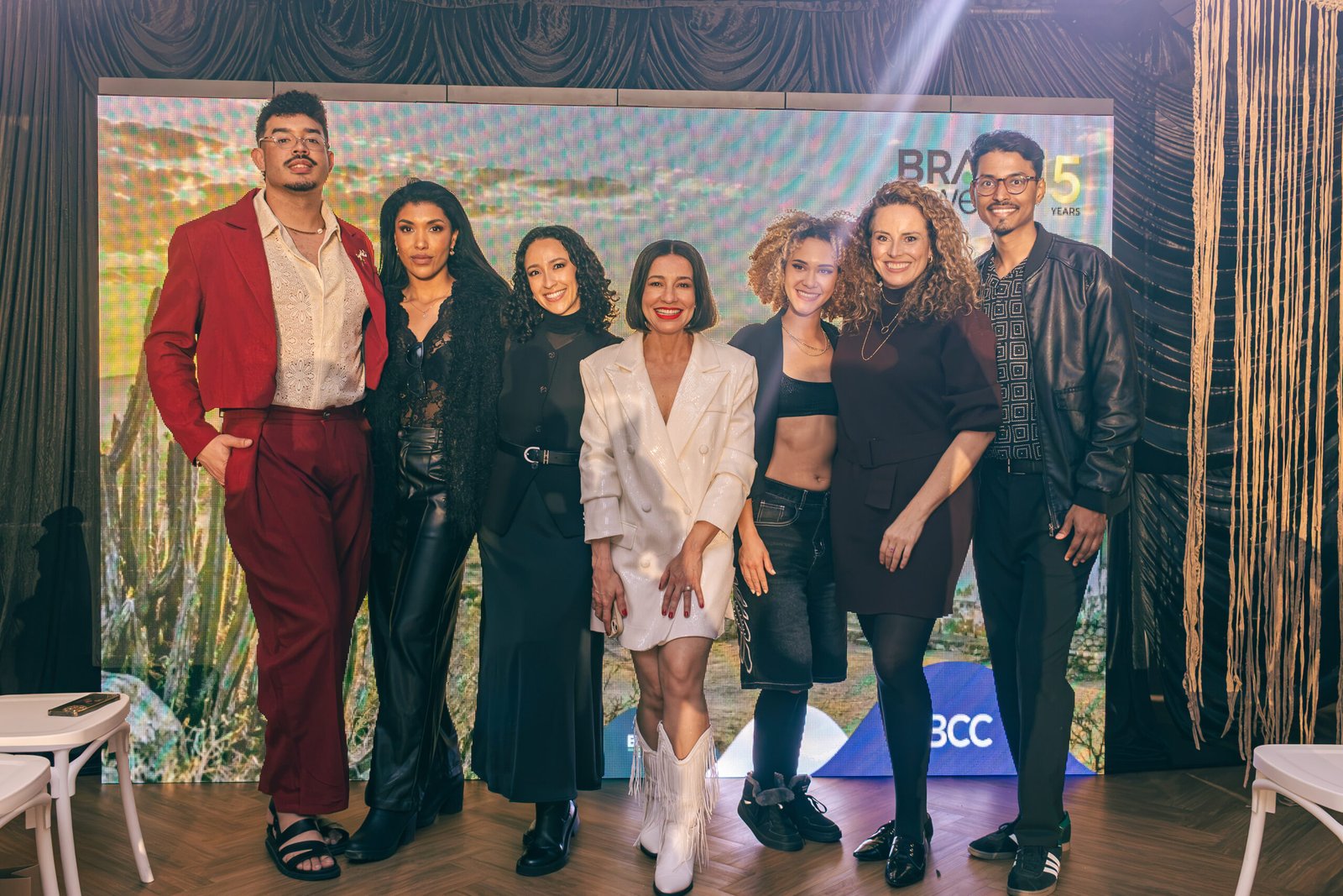 Designers and models on stage at the Brazil Week five years backdrop